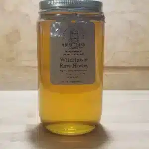 organic 1lb. raw wildflower honey in round glass jar
